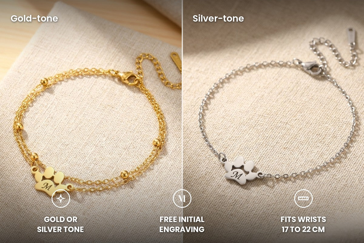 Paw print bracelet in gold-tone and silver-tone side by side, free initial engraving, fits wrists 17 to 22 cm