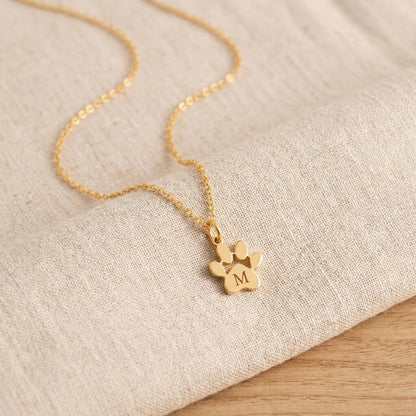 Gold-tone engraved paw print necklace