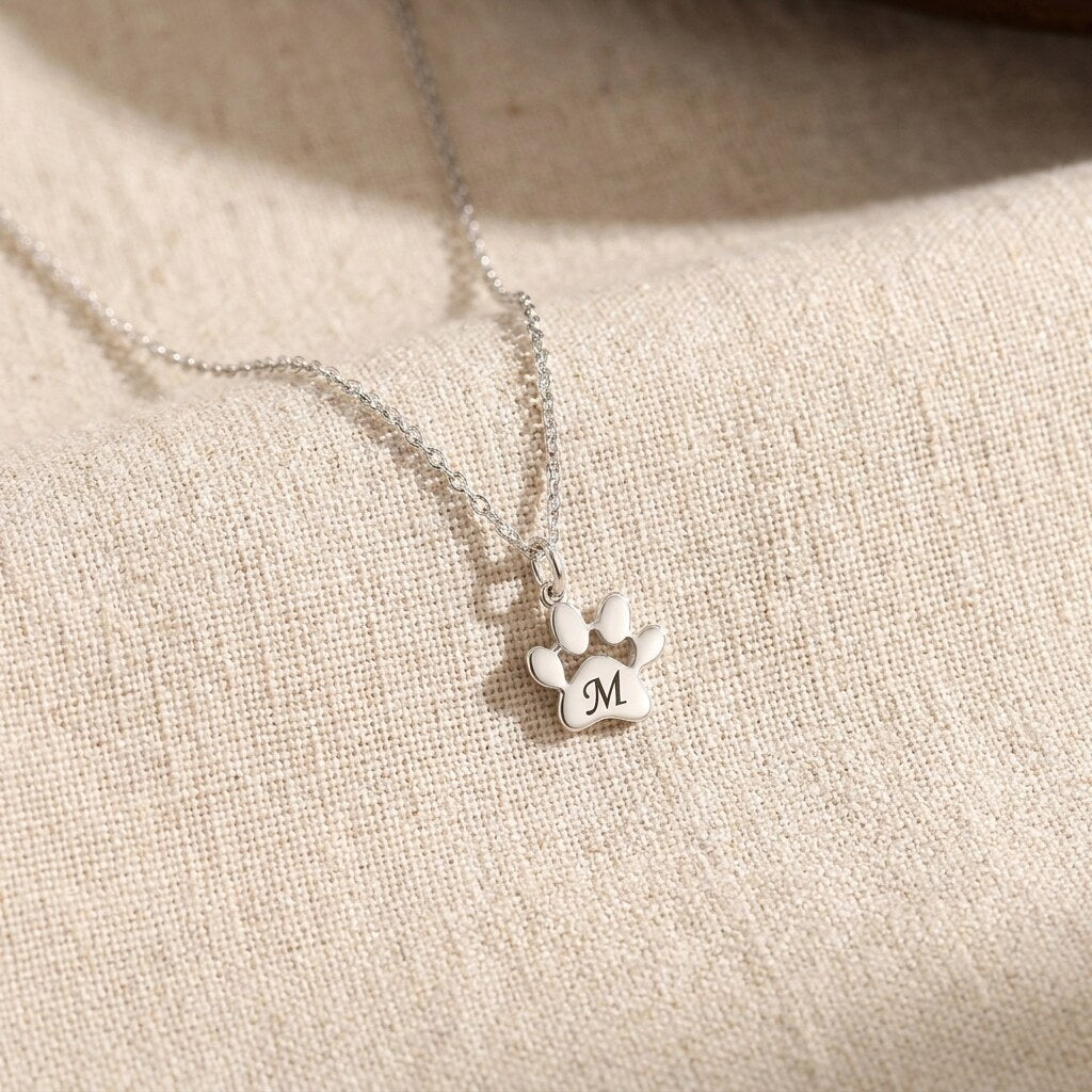 Silver-tone engraved paw print necklace